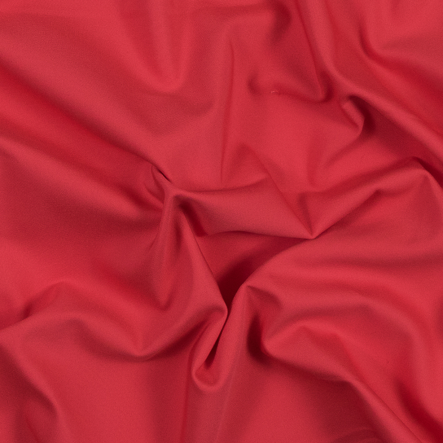 Red Coral Stretch Polyester and Viscose Woven | Mood Fabrics