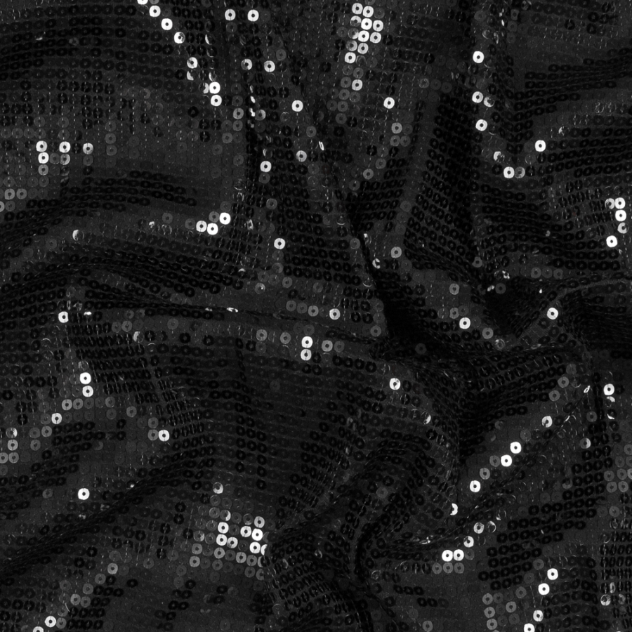 Black Jersey Knit with All-Over Circle Sequins | Mood Fabrics