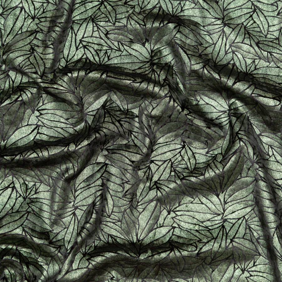 Black Stretch Velour with Metallic Green Floral Foil | Mood Fabrics