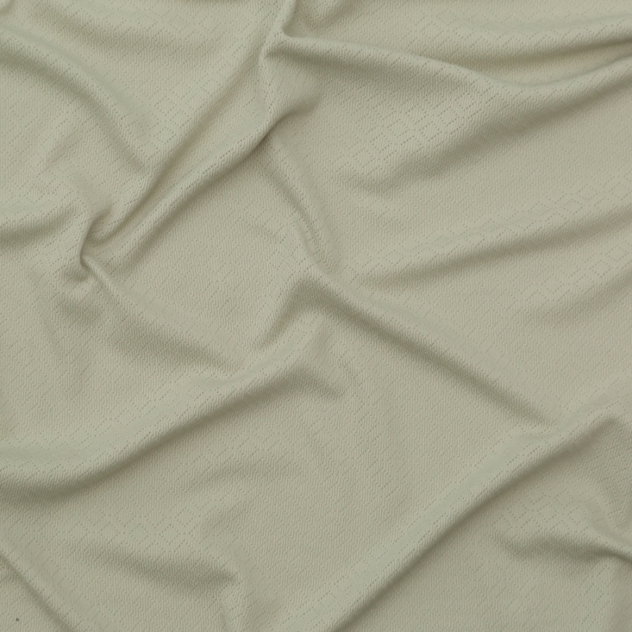 Bog Green Stretch Polyester Knit with Diamond Perforations | Mood Fabrics