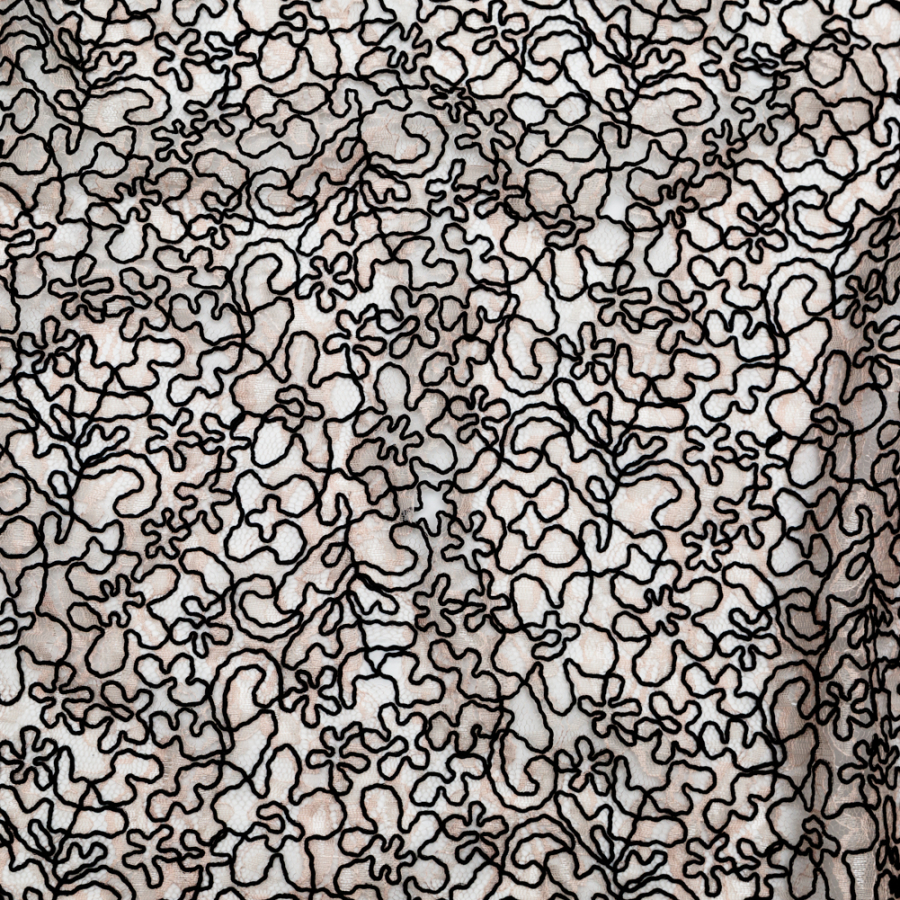 Peach Floral Chantilly Lace with Black Abstract Cording | Mood Fabrics