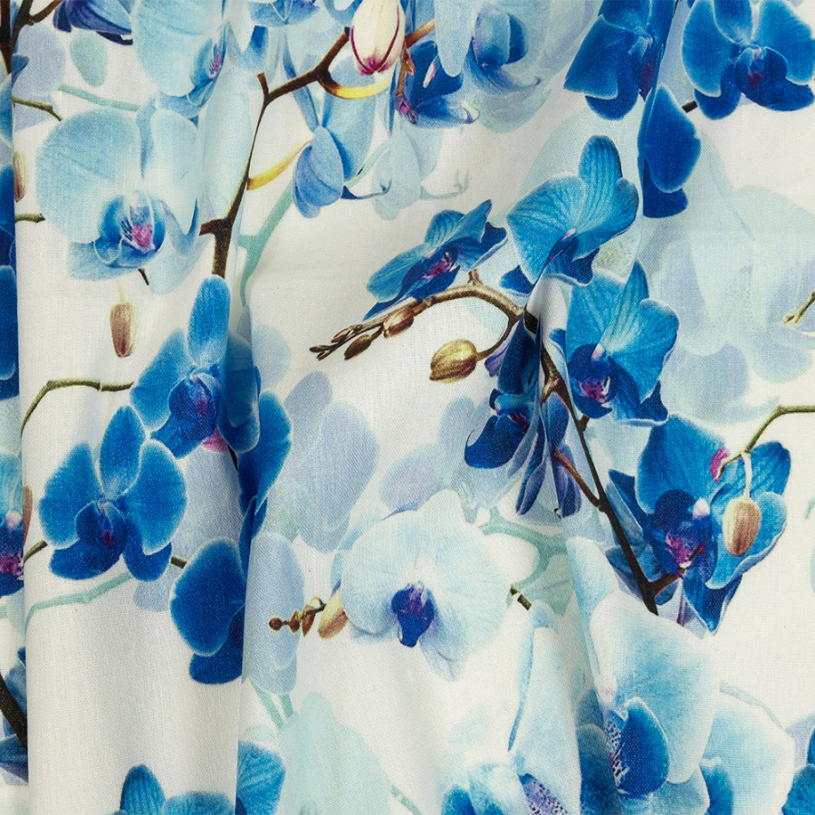 Tilted Blue Orchids and Lily White Printed Stretch Linen and Rayon Woven | Mood Fabrics