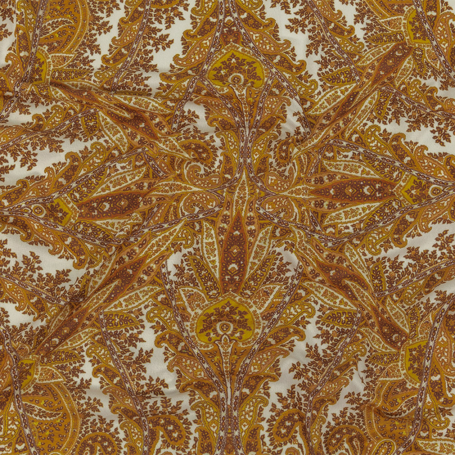 Famous Australian Designer Golden Paisley Printed Stretch Polyester Jersey | Mood Fabrics