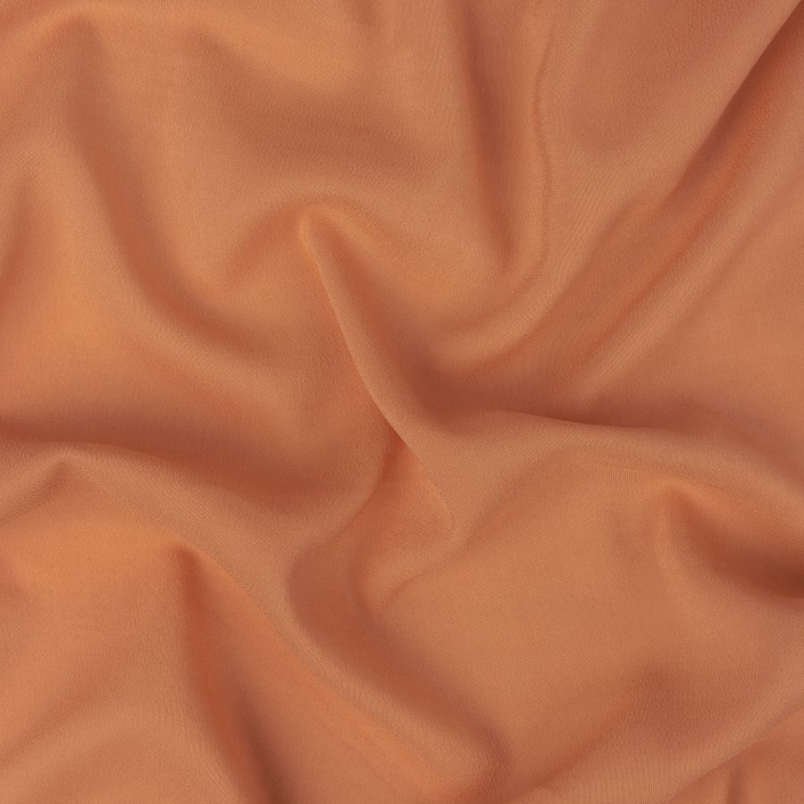 Famous Australian Designer Peach Stretch Viscose Lining | Mood Fabrics