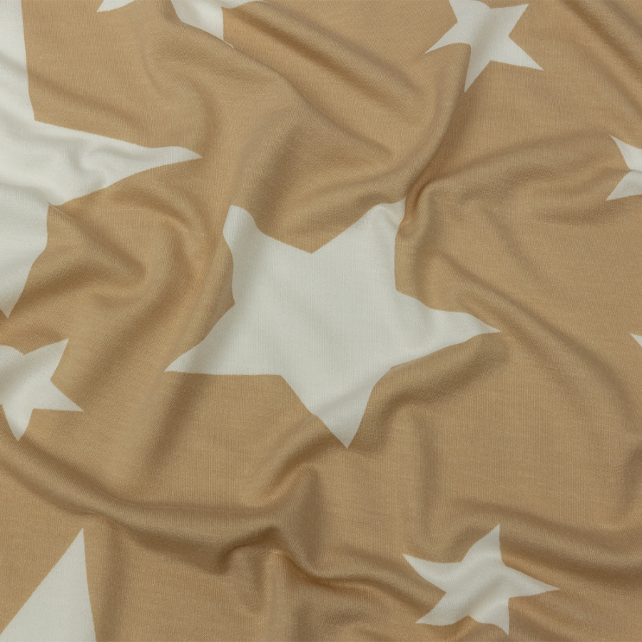 Beige and Star White Stars Stretch Polyester and Rayon French Terry | Mood Fabrics