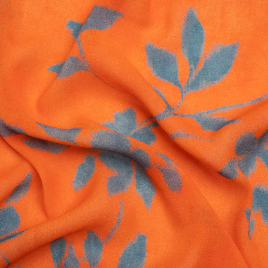 Mood Exclusive Orange and Blue Stamped on my Mind Viscose Georgette | Mood Fabrics
