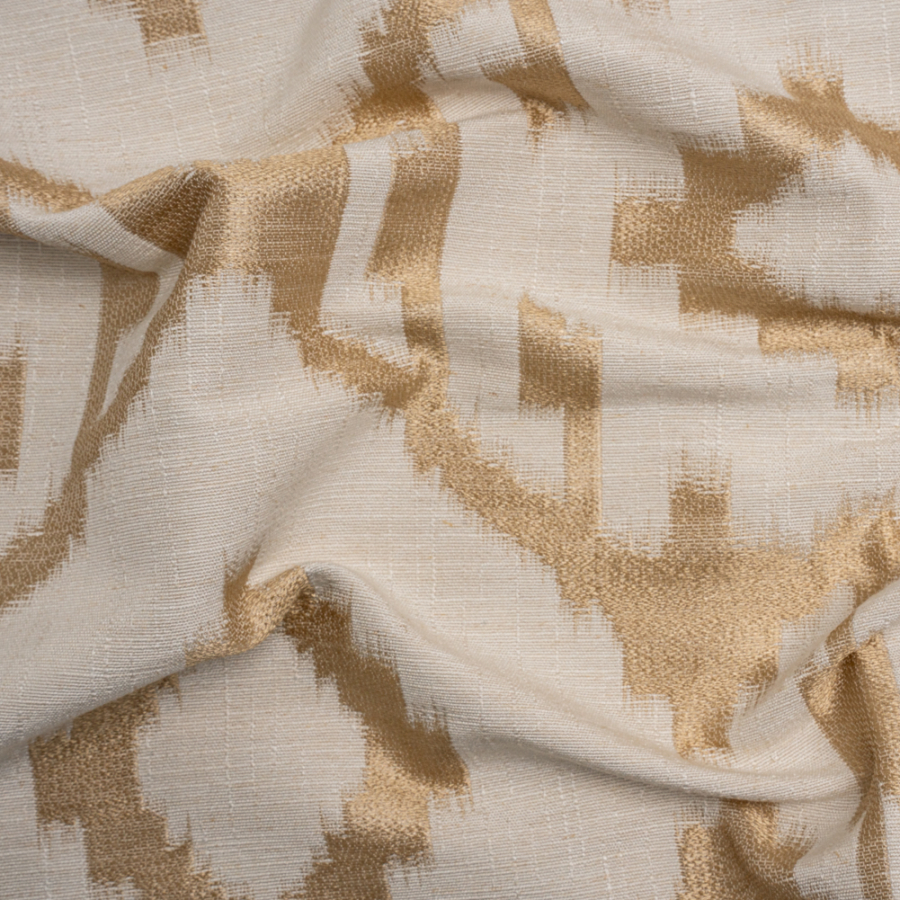 Ivory and Gold Geometric Ikat Viscose, Polyester and Linen Drapery Jacquard | Mood Fabrics