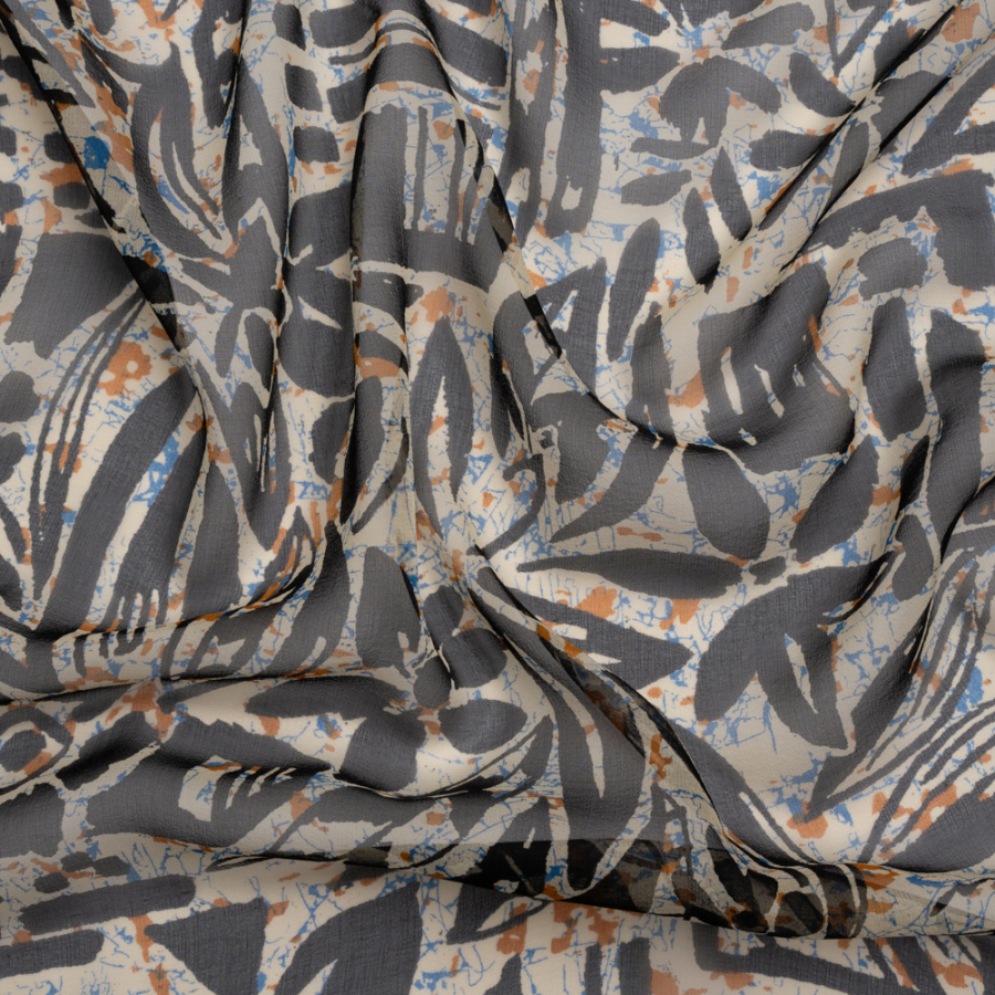 Blue, Orange and Black Wax Resist Floral Silk Chiffon | Mood Fabrics