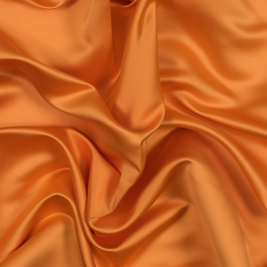 British Tangerine Polyester Satin | Mood Fabrics