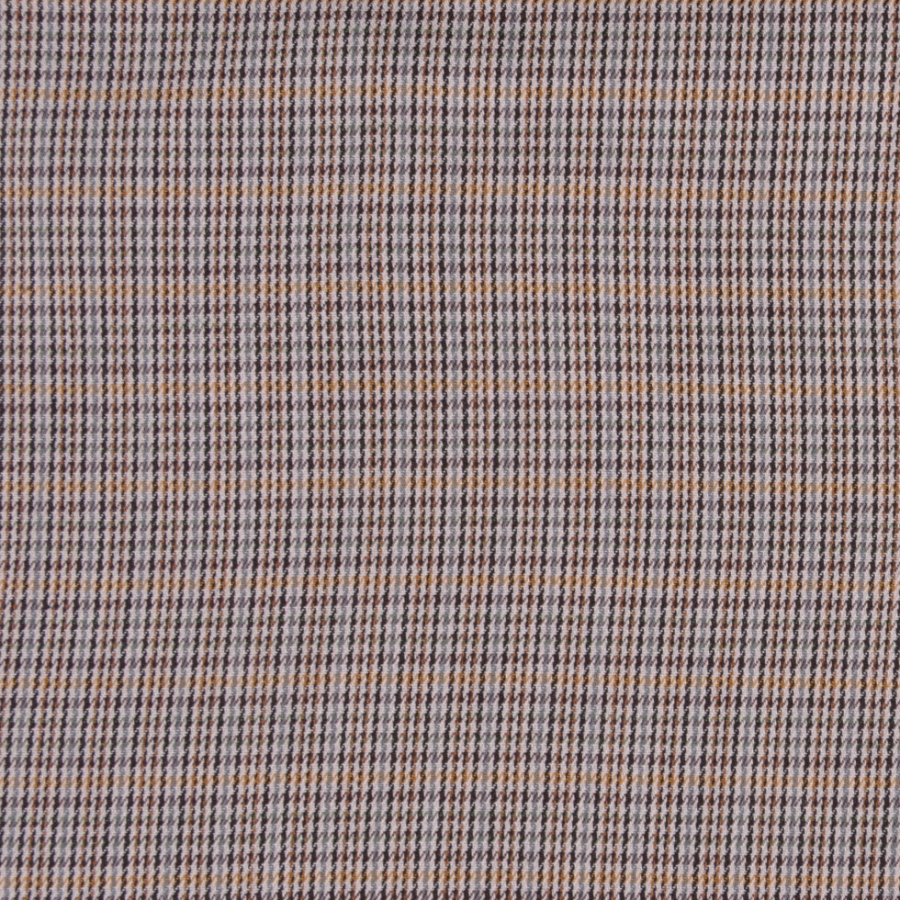 Lightweight Black and Beige Small Houndstooth Cotton Suiting | Mood Fabrics