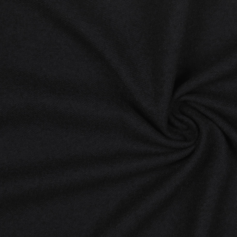 Italian Phantom Black Boiled Wool Twill | Mood Fabrics