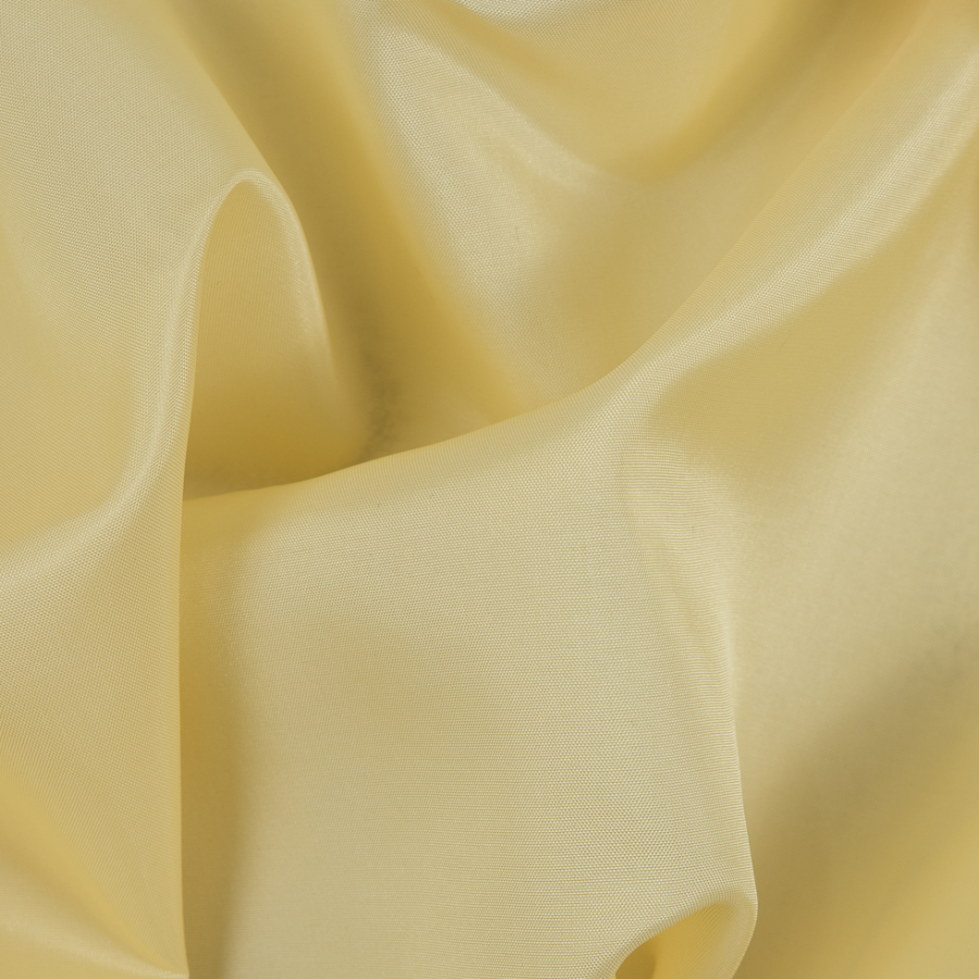 Old Yellow Polyester Lining | Mood Fabrics