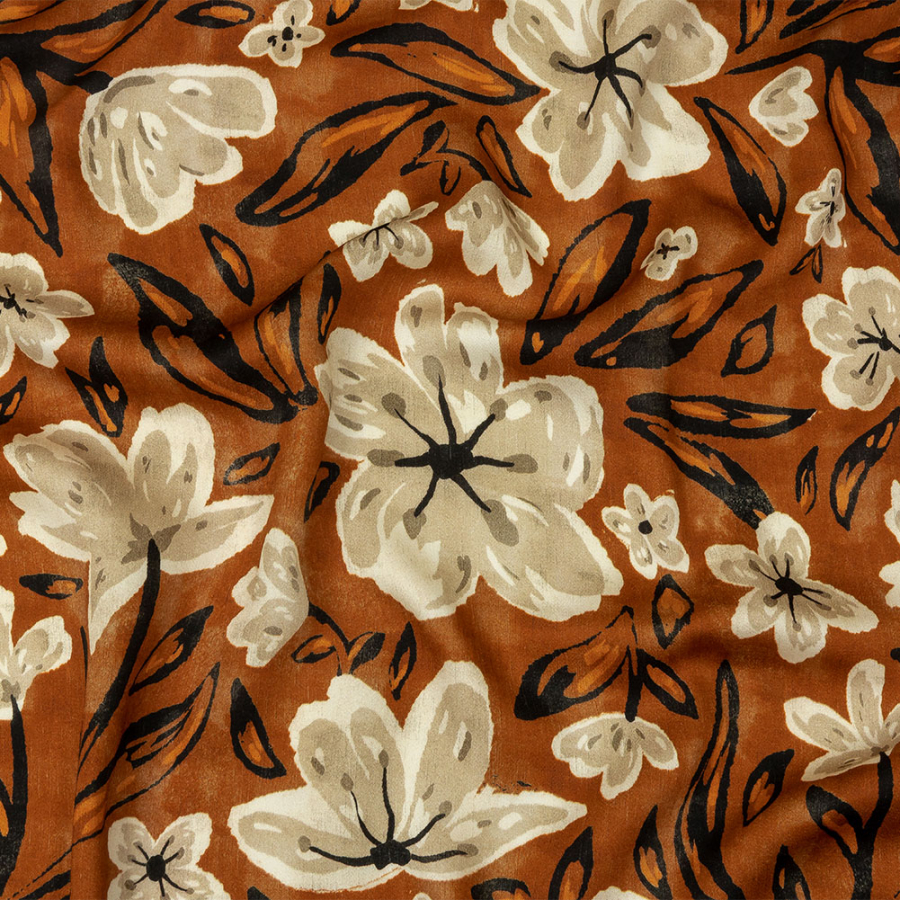 Mood Exclusive Orange Wildflower Walk Rayon Batiste | Mood Fabrics