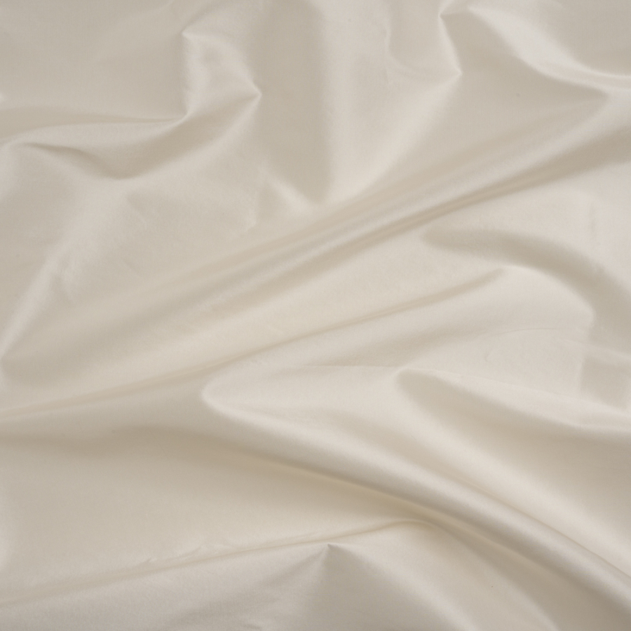 Premium Antique White Silk Taffeta | Mood Fabrics
