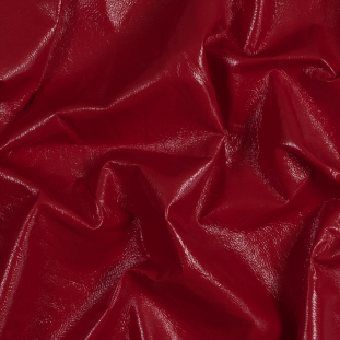 Famous NYC Designer Red Faux Patent Leather with White Fleece Backing