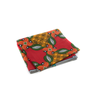 Red, Orange and Green Waxed Cotton African Print with additional Inlaid Pattern