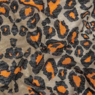 Savannah Tan , Black and Vibrant Orange Leopard Spots Polyester and Rayon Sweater Knit
