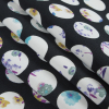 Black Polka Dotted Floral Printed Stretch Cotton Sateen - Folded | Mood Fabrics
