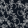 Navy/White Bows Printed on a Cotton Sateen | Mood Fabrics