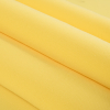 1.5mm Yellow Solid Stretch Neoprene - Folded | Mood Fabrics