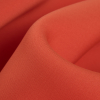 1.5mm Orange Solid Stretch Neoprene - Detail | Mood Fabrics
