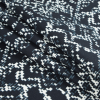 Black and Winter White Abstract Printed Stretch Cotton Sateen - Folded | Mood Fabrics