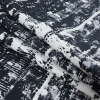 Black and Whisper White Abstract Printed Stretch Cotton Sateen - Folded | Mood Fabrics