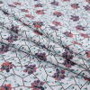 European Red and Angel Blue Floral and Feathered Cotton Poplin - Folded | Mood Fabrics