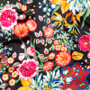 Italian Black, Green and Tangerine Floral Digitally Printed Silk Charmeuse | Mood Fabrics