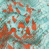 Italian Aqua and Chili Python Printed Silk Charmeuse - Detail | Mood Fabrics