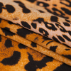 Italian Golden Brown Jaguar Digitally Printed Silk Charmeuse - Folded | Mood Fabrics