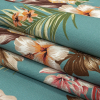 Mood Exclusive Turquoise Hibiscus Holiday Stretch Cotton Twill - Folded | Mood Fabrics