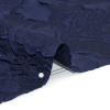 Luminous Navy Crinkled Luxury Brocade - Detail | Mood Fabrics