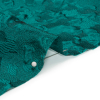 Luminous Teal Wild Spots Lightweight Luxury Brocade - Detail | Mood Fabrics