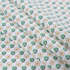 Green and Yellow Floral Printed Cotton Woven - Folded | Mood Fabrics