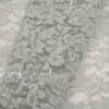 Metallic Platinum Floral Scallop-Edged Lace - Folded | Mood Fabrics