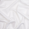 5.6 oz White Matte Tricot w/ High Compression | Mood Fabrics