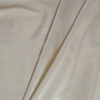 White Polyester Tricot Mesh with All Over Gold Foil - Folded | Mood Fabrics