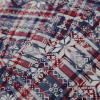 Red/Blue/Gray Snowflake Printed Plaid Stretch Cotton Twill - Folded | Mood Fabrics
