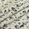 Blue/White Floral Herringbone Combed Cotton Dobby Jacquard - Folded | Mood Fabrics