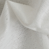 Off-White Polyester Weft Knit Fusible Interfacing - Detail | Mood Fabrics