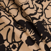 Marzipan/Black Floral Printed Woven - Folded | Mood Fabrics