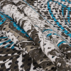 Italian Hawaiian Ocean/White/Dusty Olive Abstract Floral Printed Knit Lace w/ Eyelets - Folded | Mood Fabrics
