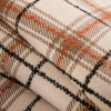Orange/Ivory Plaid Wool Twill and Solid Felt Double Cloth - Folded | Mood Fabrics
