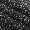 Black/White Abstract Novelty Creped Wool Blend - Folded | Mood Fabrics