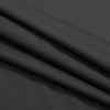 Black UV Protective Stretch Waterproof Tricot - Pleather - Folded | Mood Fabrics