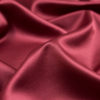 Italian Brick Red Stretch Polyester Charmeuse - Detail | Mood Fabrics