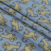 Celestial Blue and Shadow Green Egyptian Dogs Printed on a Rayon Challis - Folded | Mood Fabrics