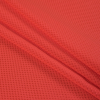 Luminous Neon Orange Stretch Knit Piqued Jacquard - Folded | Mood Fabrics