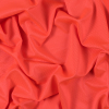 Luminous Neon Orange Stretch Knit Piqued Jacquard | Mood Fabrics